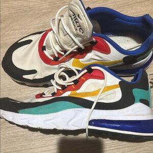Nike Kids White, Red, Yellow, and Blue Sneakers